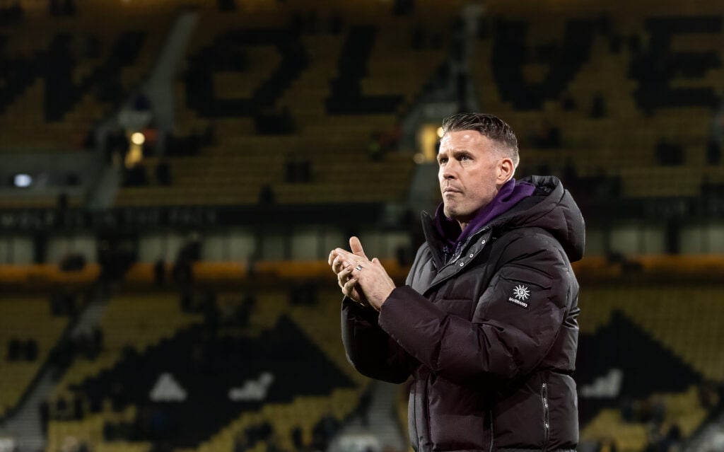 Wolves manager Rob Edwards applauds the fans at Molineux.