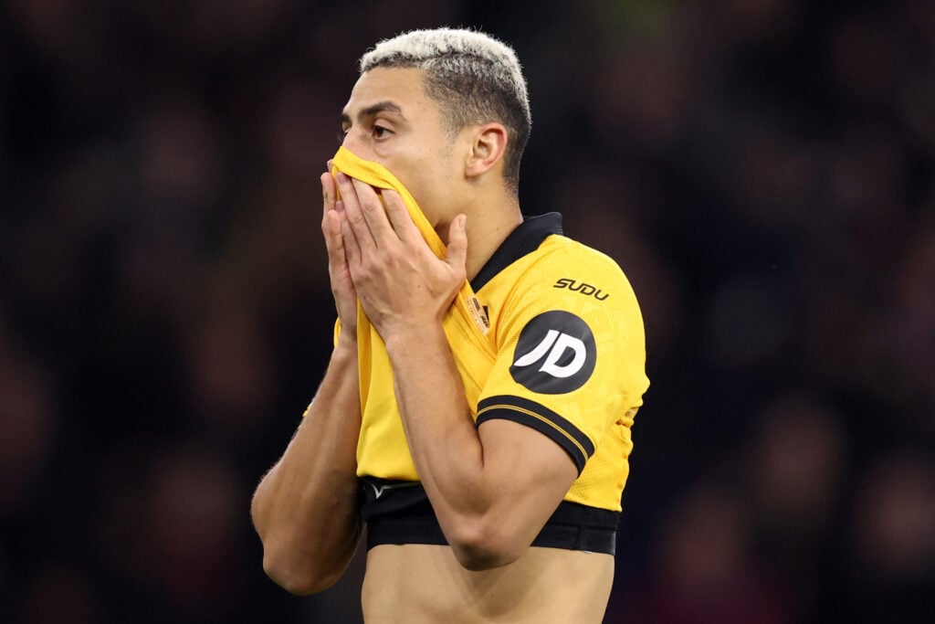 Andre with his head in his hands