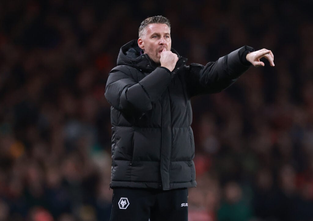 Wolves manager Rob Edwards points.