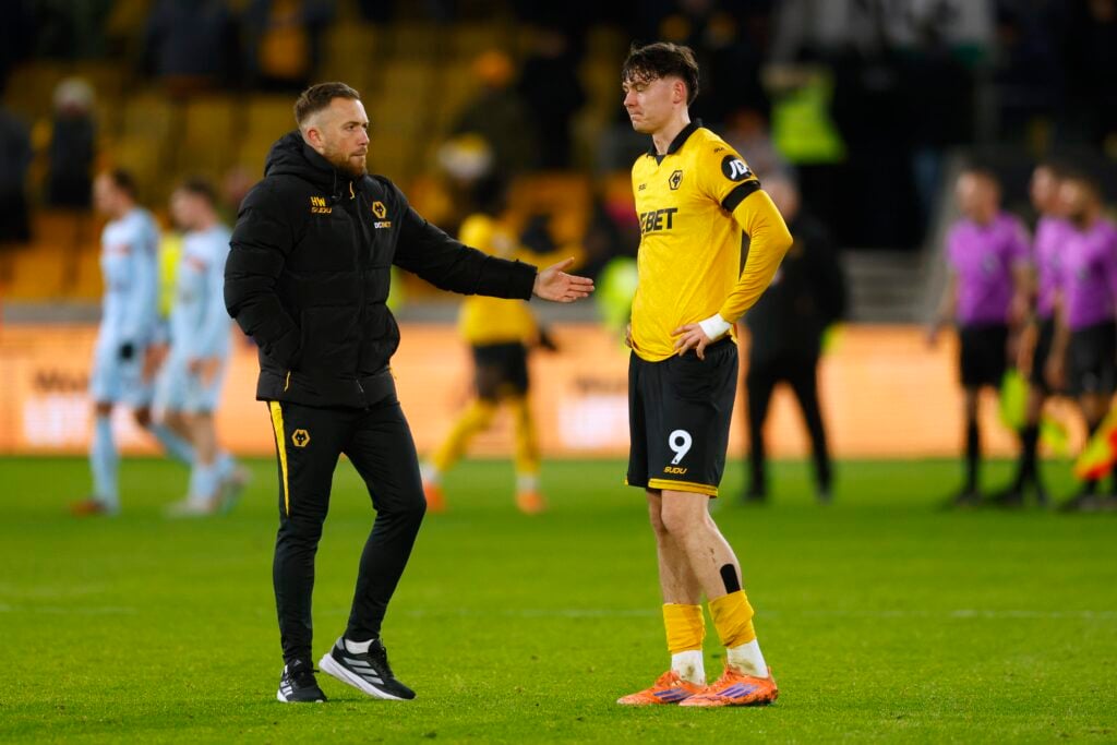 Jorgen Strand Larsen being consoled at Molineux.