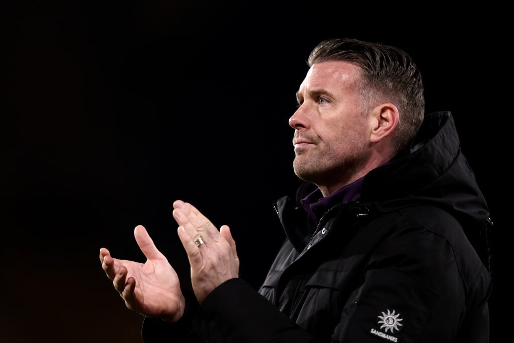 Rob Edwards appluding Wolves fans