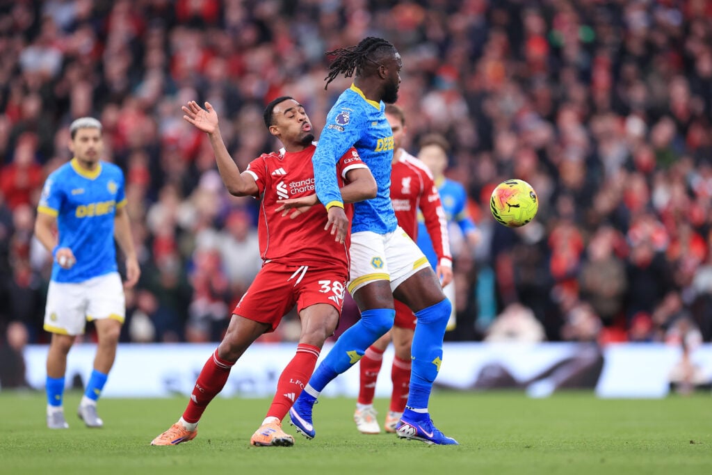 Ryan Gravenberch of Liverpool battles with Tolu Arokodare of Wolverhampton Wanderers during the Premier League match between Liverpool and Wolverhampton Wanderers