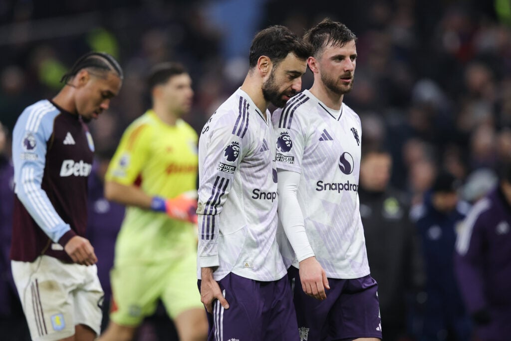 Bruno Fernandes of Manchester United goes off the field with an injury at half-time during the Premier League match between Aston Villa and Manchester United