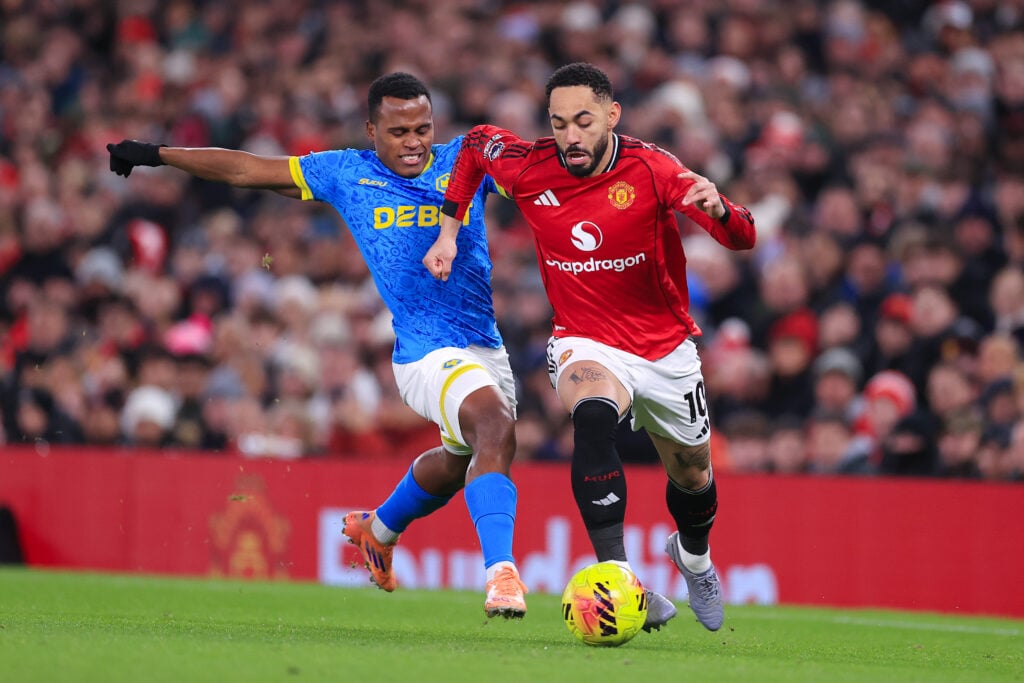 Jhon Arias battling for the ball for Wolves.