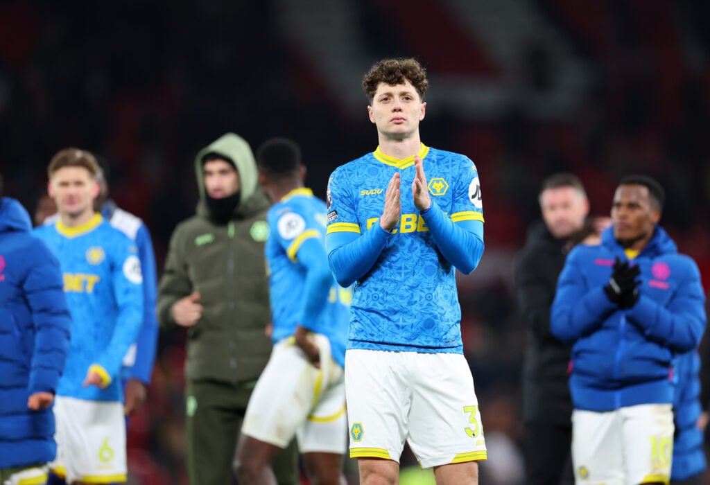 Ladislav Krejci and Wolves players applaud the fans.
