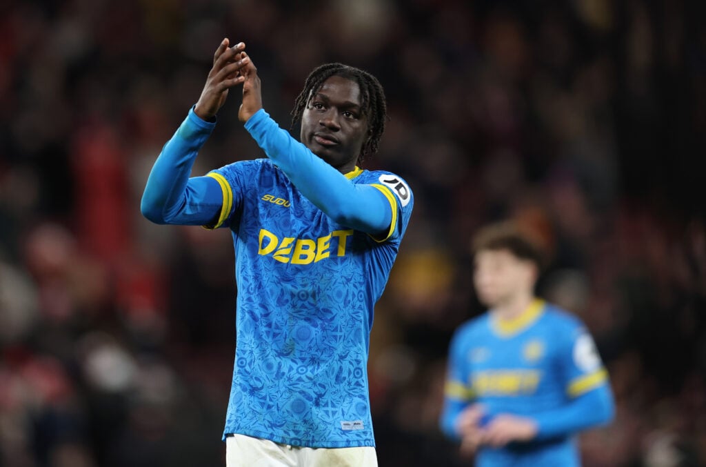 Mateus Mane of Wolverhampton Wanderers applauds the fans following the team's defeat during the Premier League match between Liverpool and Wolverhampton Wanderers