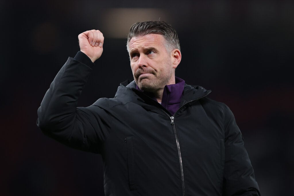 Wolves manager Rob Edwards pumps a fist.