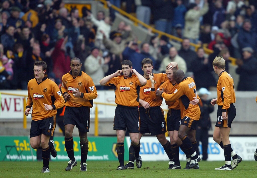 Kenny Miller (3rd R) of Wolverhampton Wanderers celebrates with his team-mates after scoring the first goal for Wolverhampton Wanderers during the FA Barclaycard Premiership match between Wolverhampton Wanderers and Manchester United