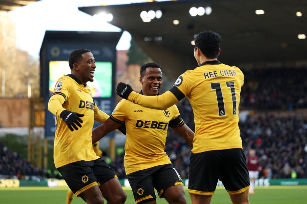 Jhon Arias celebrates scoring for Wolves.