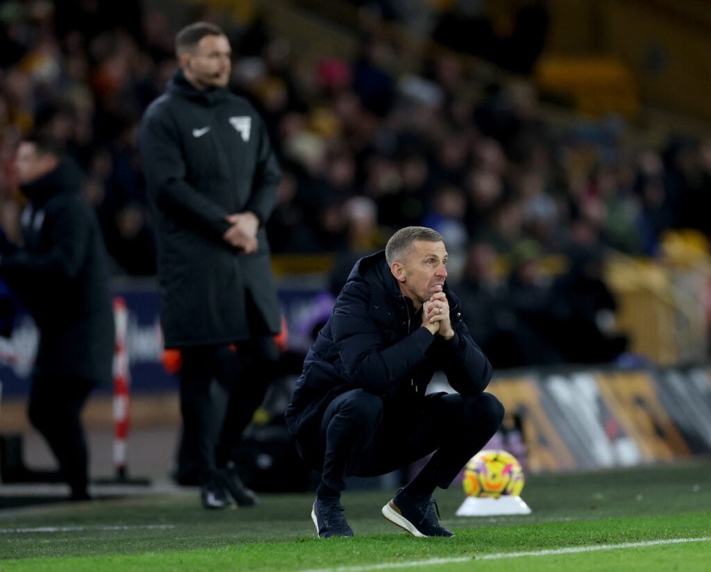 Gary O'Neil crouches while watching Wolves.