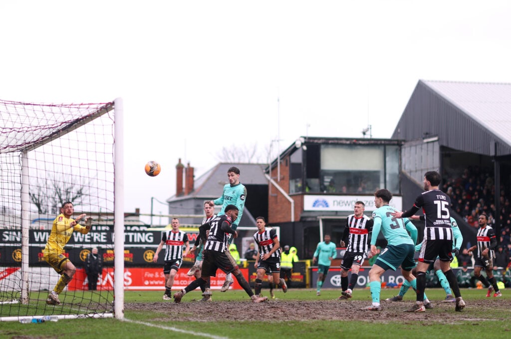 Santiago Bueno scores for Wolves against Grimsby Town.