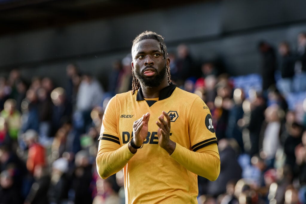 Wolves striker Tolu Arokodare claps fans.