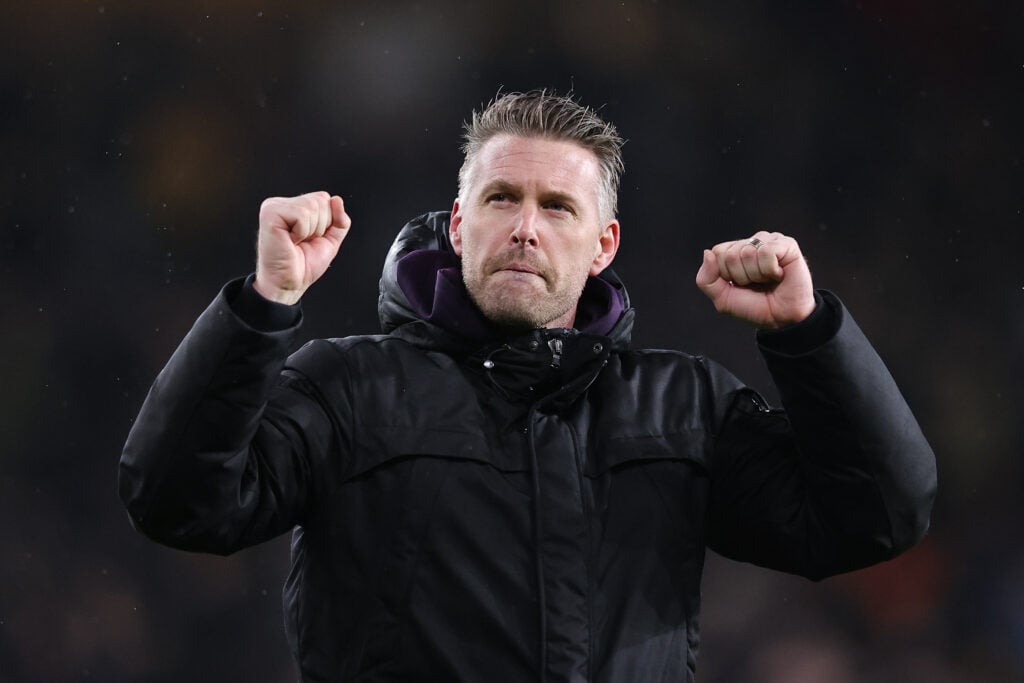 Rob Edwards celebrates a Wolves win.