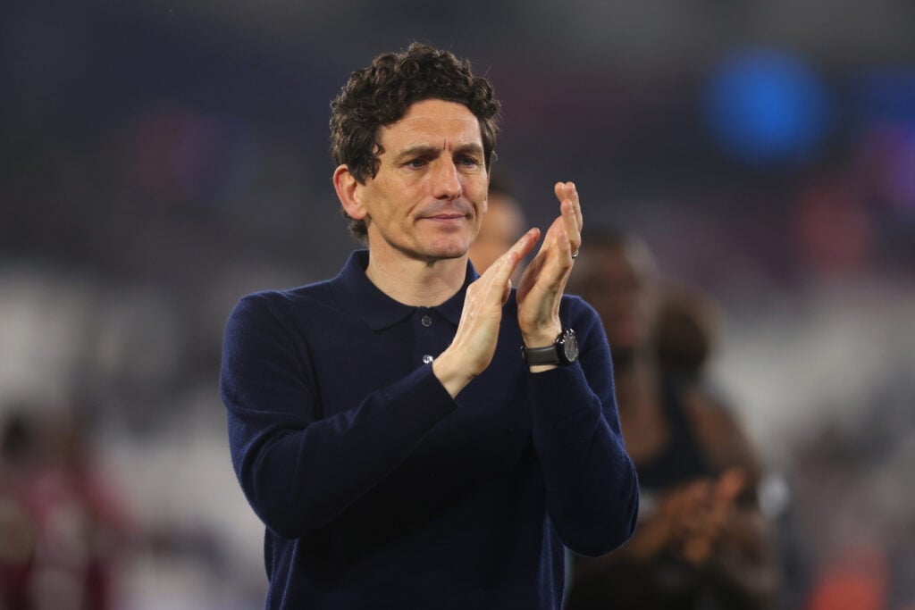Keith Andrews claps fans.