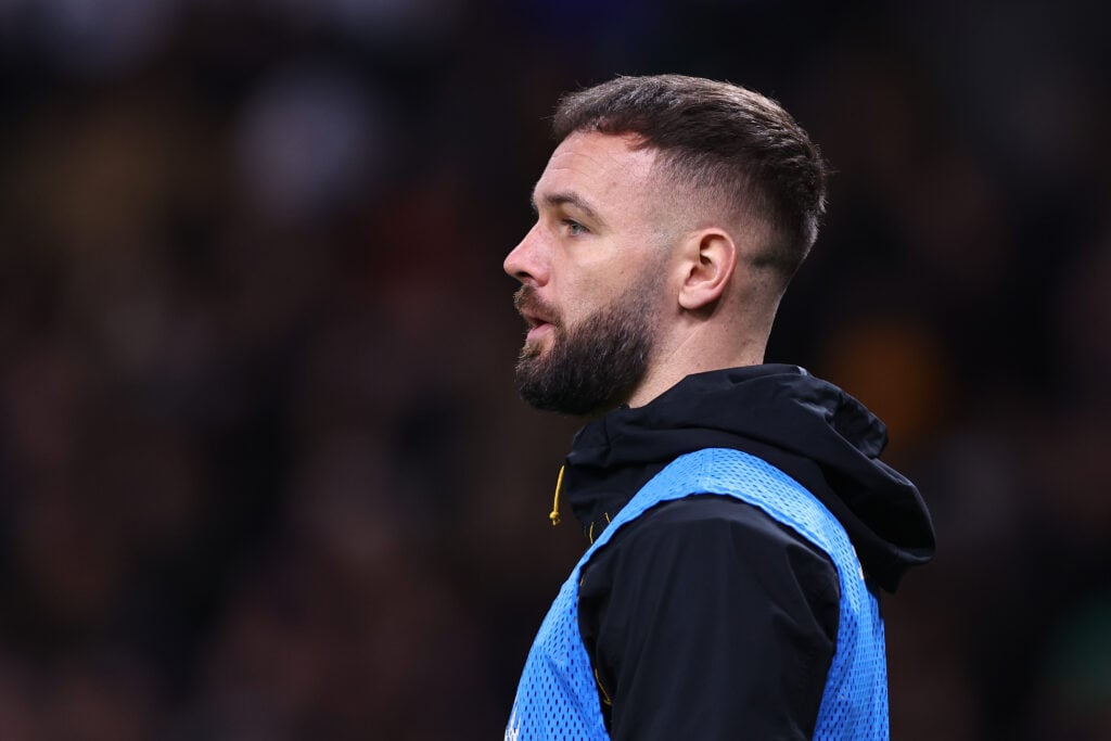 Adam Armstrong warms up for Wolves.