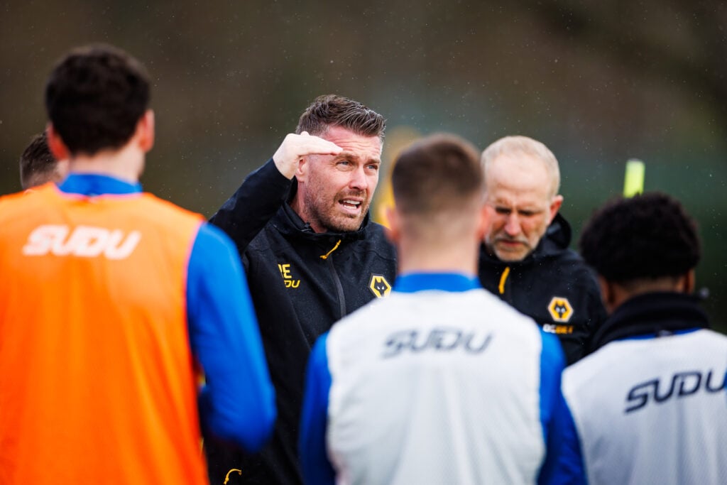 Rob Edwards takes Wolves training.