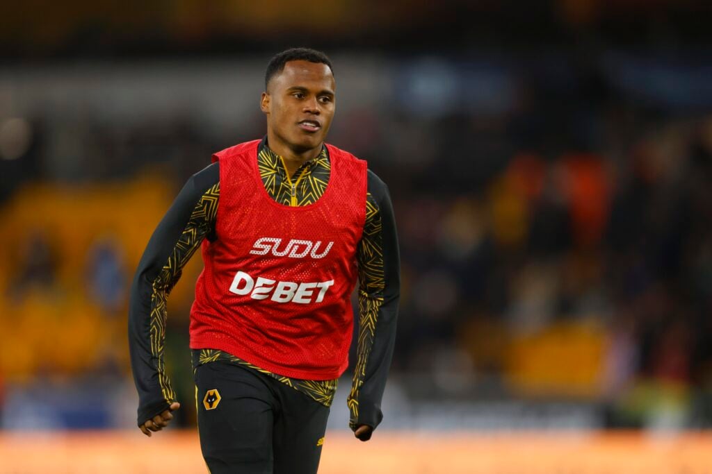 Jhon Arias warming up for Wolves.