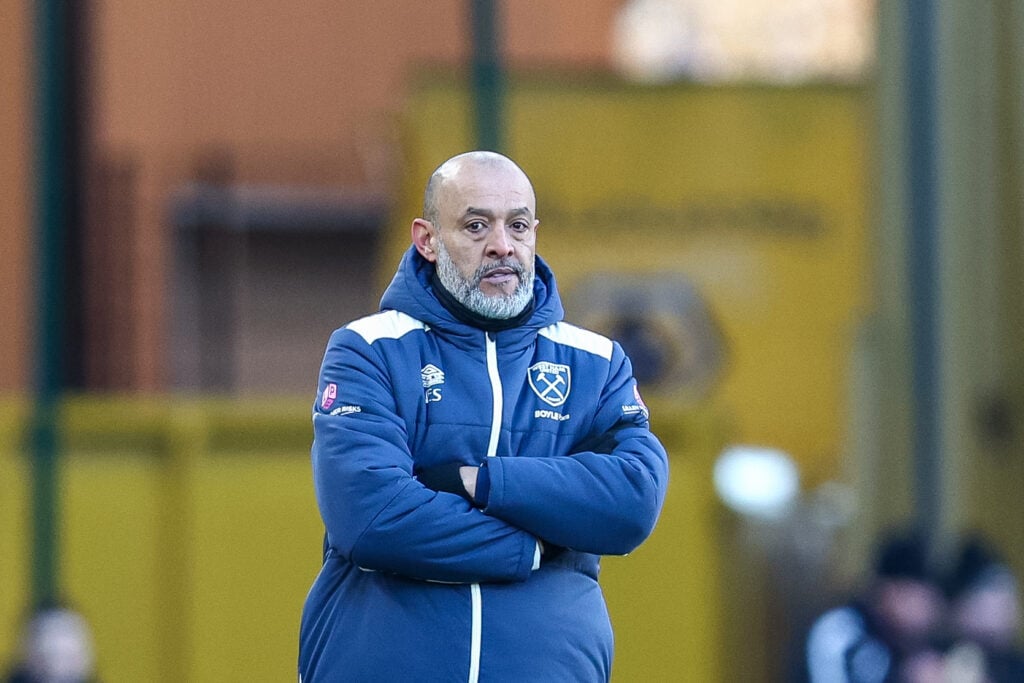 Nuno Espirito Santo folding his arms.