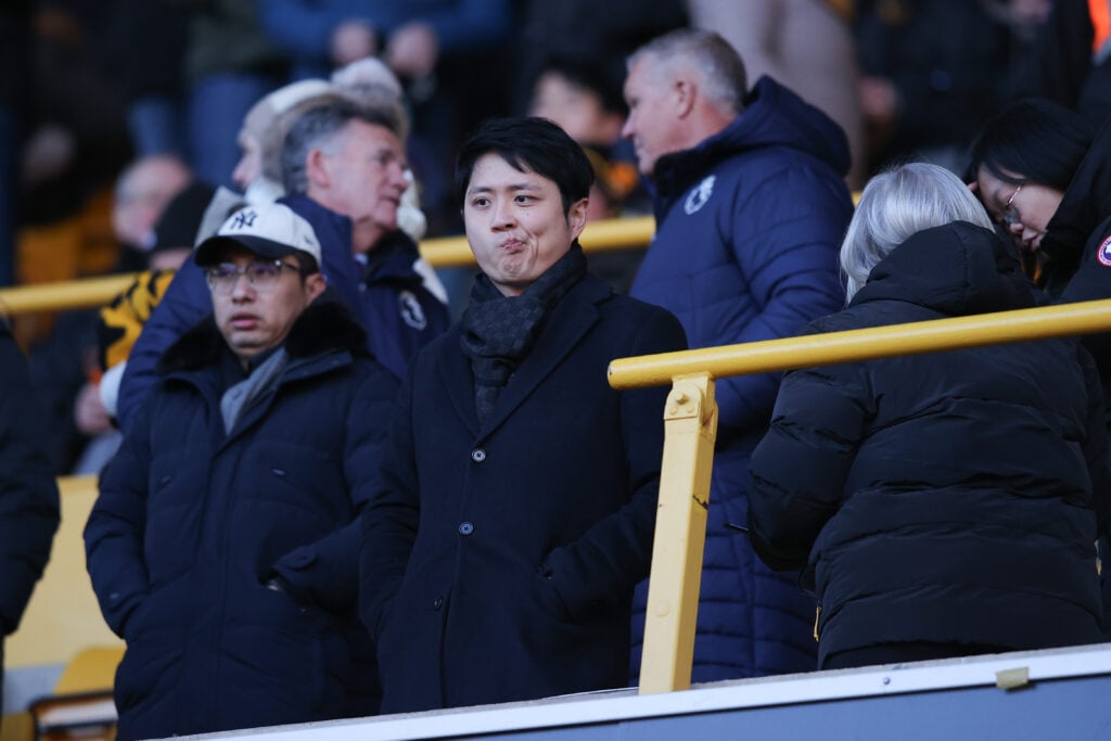 Nathan Shi looks on at Molineux.