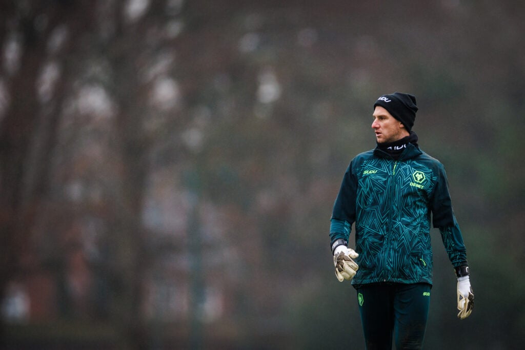Sam Johnstone warming up for Wolves.