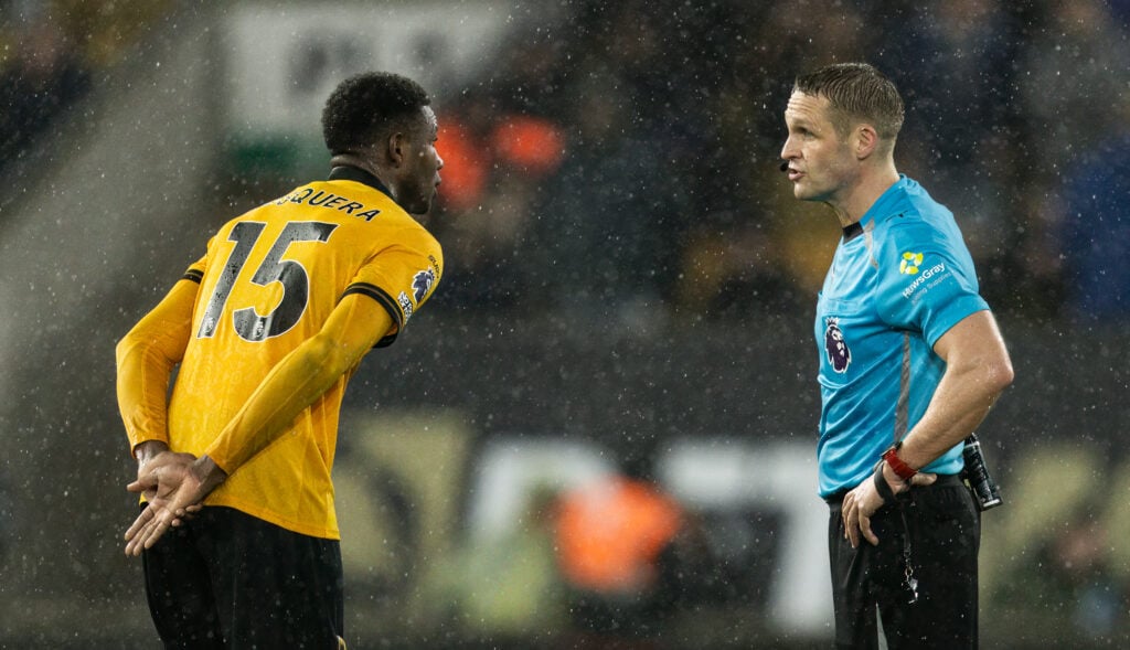 Yerson Mosquera talks with referee Chris Pawson.