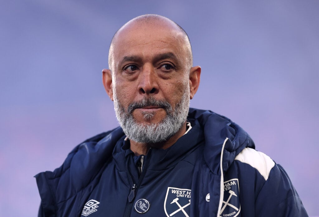 Nuno Espirito Santo looks on.