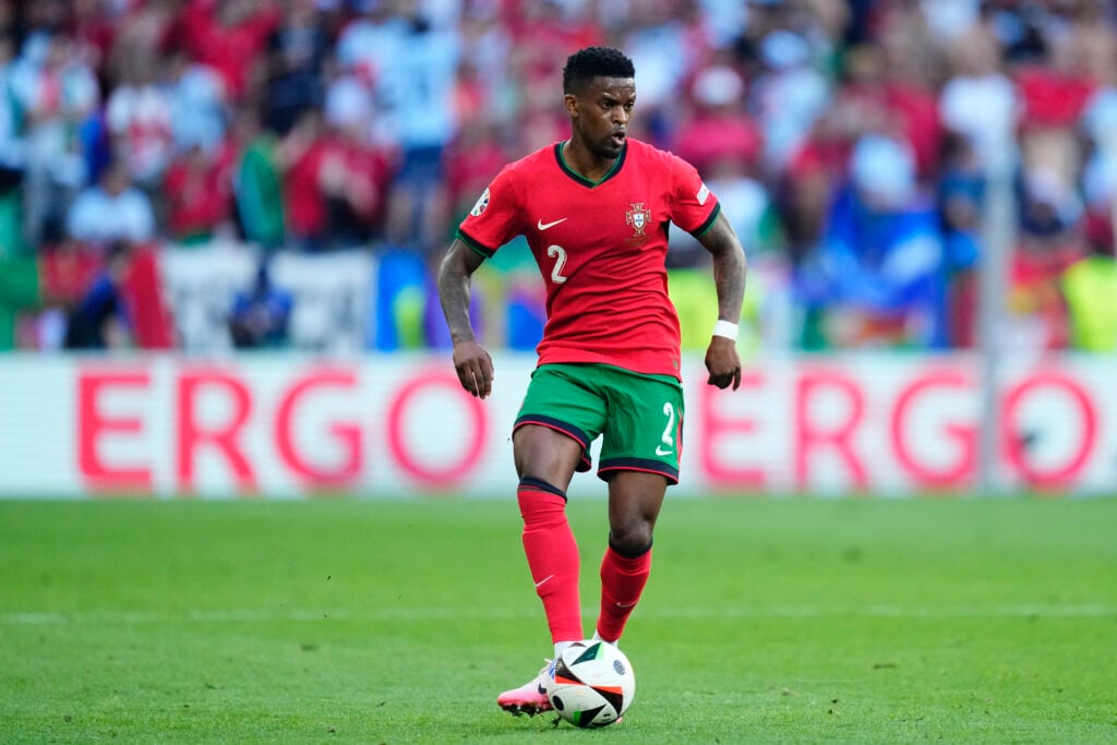 Nelson Semedo plays a pass for Portugal.