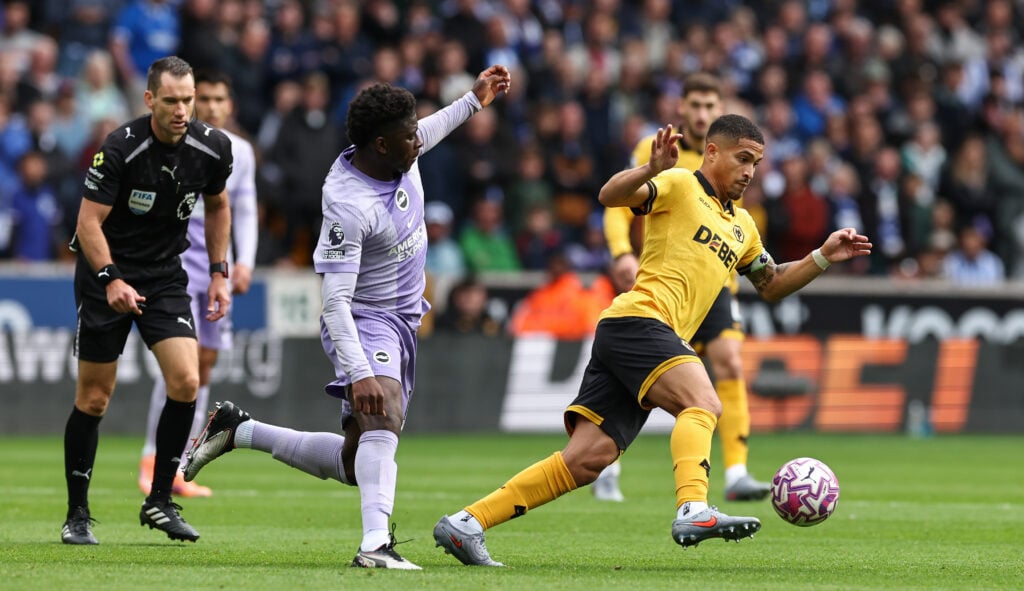 Joao Gomes playing for Wolves.