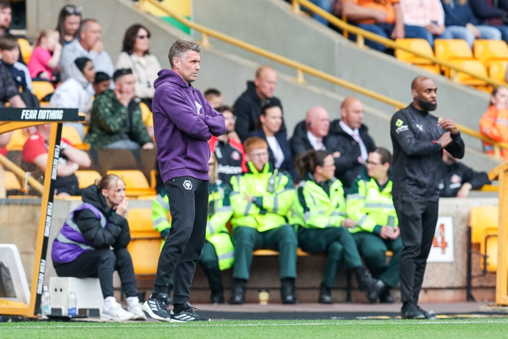 Rob Edwards managing Wolves at Molineux.