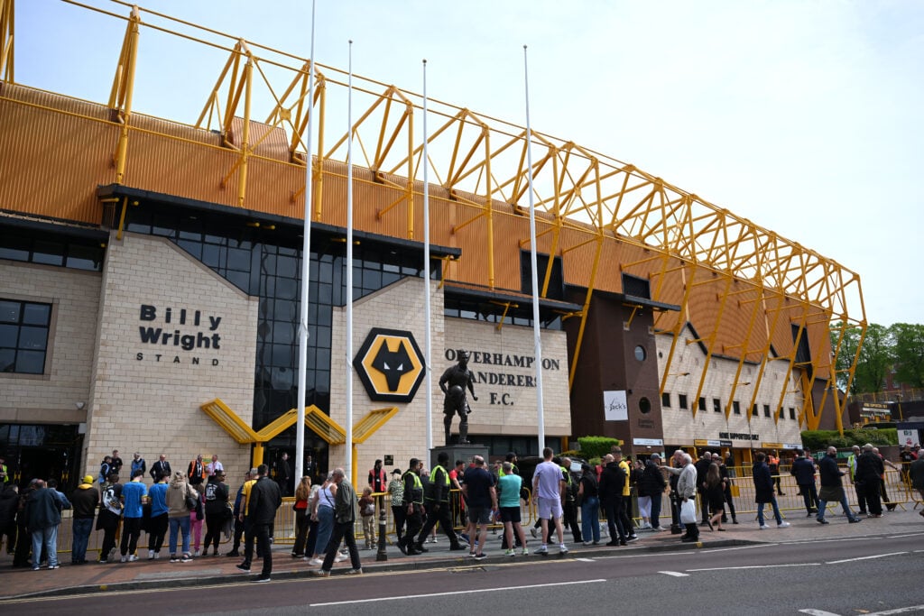 Wolves fans gather outside Molineux.
