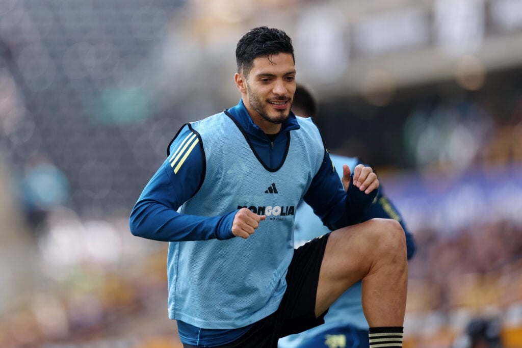 Raul Jimenez warms up for Fulham.