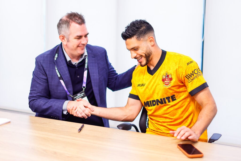 Raul Jimenez shakes hands with Matt Wilde.