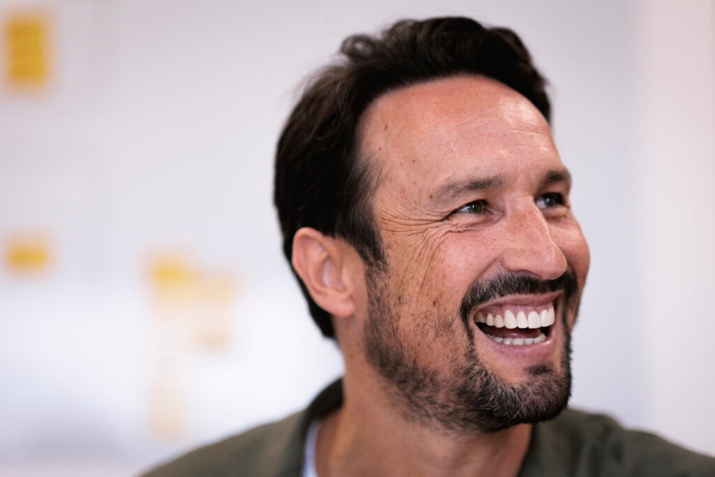 Cesar Peixoto is all smiles.
